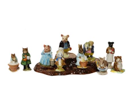 Beswick Beatrix Potter figures including: 'Pickles' and 'Simpkin', 'Tommy Brock', spade handle out, and various other 3a and 