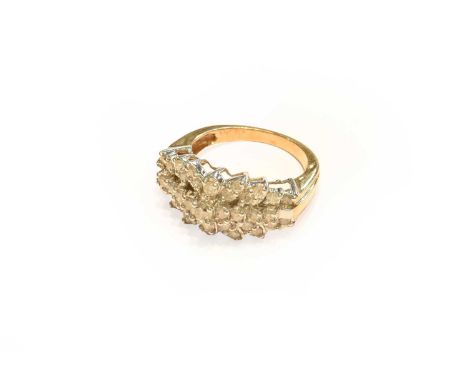 A 9 carat gold diamond cluster ring, finger size PGross weight 5.5 grams.