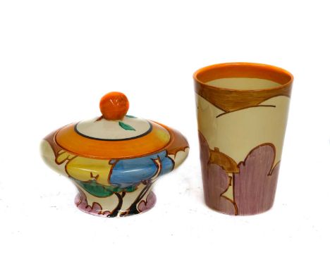 Clarice Cliff beaker and a jar and coverBeaker with some scratches to the enamel, no chips or cracks, jar and cover with a pa