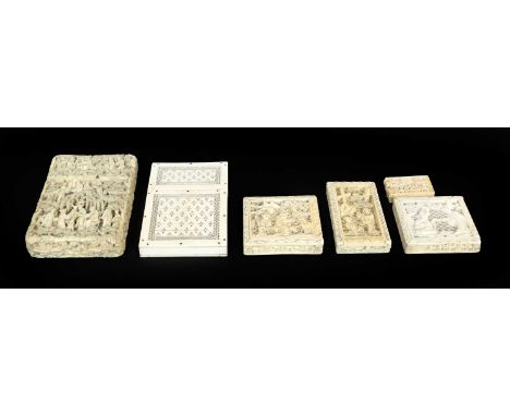 A 18th century Cantonese carved ivory card case; together with a similar Anglo Indian pierced example, three 19th century Can