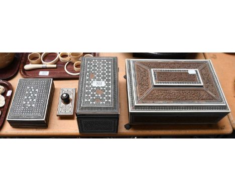 A 19th century Anglo Indian fitted workbox of Sarcophagus form, 32cm wide; together with a similar tea caddy, another box, an