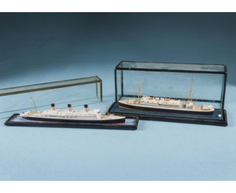 Two vintage cased Bassett-Lowke waterline models of ships, one of MV Asturias, lifeboat loose, the other the White Star Liner