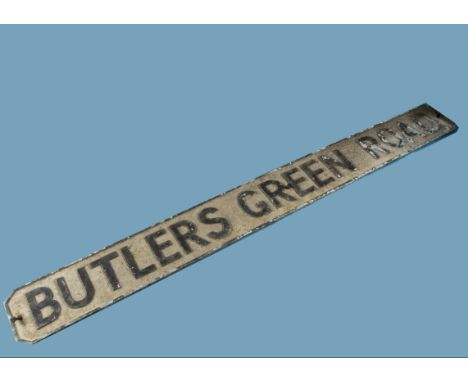 A vintage cast Aluminium road name sign, "Butlers Green Road", manufactured by Royal Label Jackson, 145cm x 15.5cm.