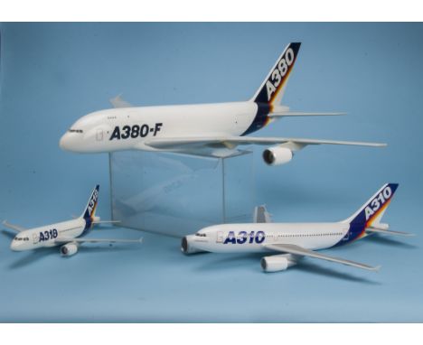Three 1980s fibreglass travel agent models of Airbus aircraft, including a Space Models large A380-F, one wing repaired and o