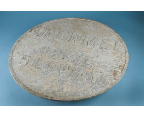 A vintage Irish town road sign, "Clonmel" County Tipperary, drive slowly, a large circular sign in cast aluminium, no makers 