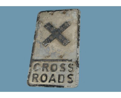 A vintage 'Cross-Roads' junction road sign, in cast Aluminium with inset clear reflectors to the "cross" and "Cross Roads" in