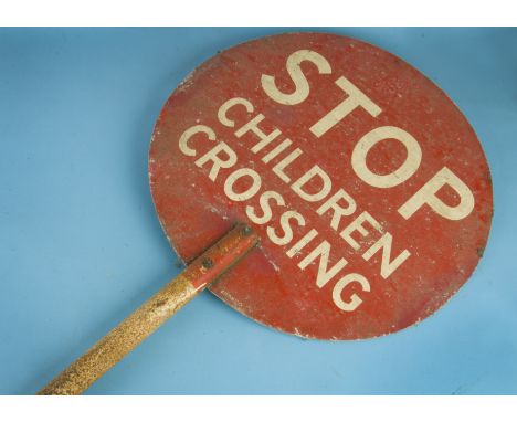 A vintage hand held 'Stop Children Crossing' sign, the lollypop circular sign on painted metal support, 187cm