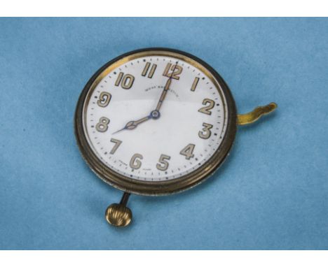 An Art Deco period automobile dashboard repeater clock, marked West End Watch to enamel dial with Arabic numerals, appears to