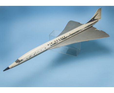 A vintage fibreglass model of Concorde, in "Air France" livery, possibly a travel agents model, some damages, notably left wi