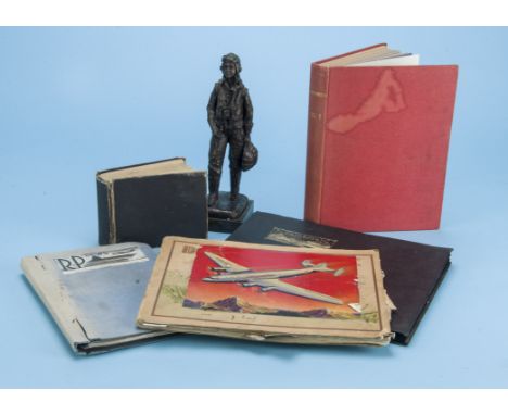 A vintage album containing WWII and other aircraft, mostly RP postcards in a black album, together with a limited edition spe