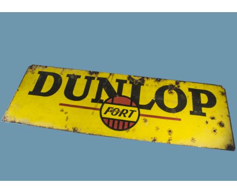 A large vintage enamel Dunlop advertising sign, in yellow black and red and stating "Dunlop Fort", 46cm by 147cm