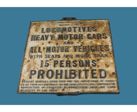 A vintage cast Iron 1920 Road Act sign, Heavy vehicles and Locomotives, with prohibited vehicles listed with seats of more th