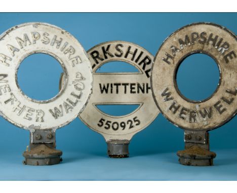 Three vintage circular post top town road signs, two from Hampshire, including, "Nether Wallop" and "Wherwell" together with 