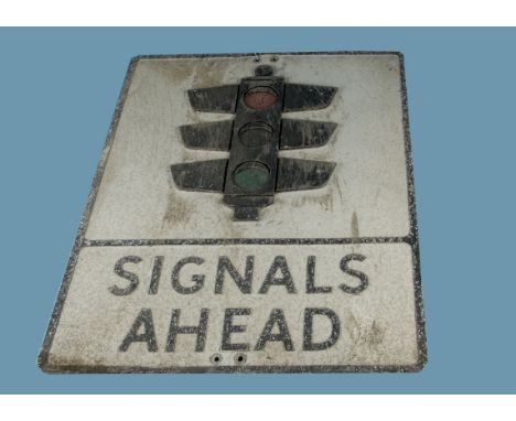 A vintage 'Signals Ahead' road sign, in pressed aluminium with applied cast traffic light graphic with "Signals Ahead" in box