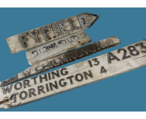 A group of four vintage wooden sign post arms, various locations with distance milage indicators including "Fyfield" ( inset 