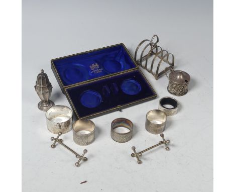 A pair of Victorian silver Knife Rests, by&nbsp;Haseler Brothers, hallmarked Birmingham 1897, of traditional form, 7cm long, 
