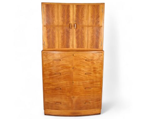 A fine quality handmade 1930s Art Deco tall boy, the concave front cabinet on bow front chest, the fitted interior with secre