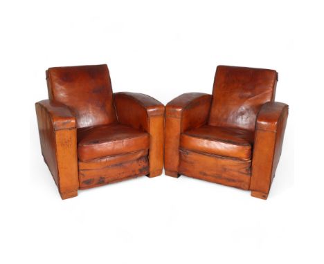 A Pair of mid 20th century leather club chairs, in the style of JACQUES ADNET, height 75cm, depth 90cm, width 80cmWorn condit