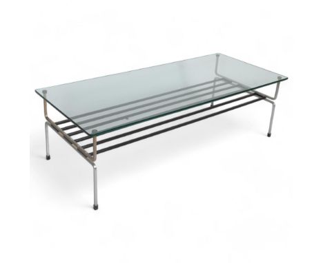 WILLIAM PLUNKETT, a rare mid-century coffee table, the rectangular glass top on shaped steel base, height 34cm, top 112 x 49c