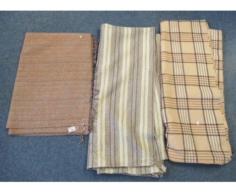 Two vintage woollen blankets; one orange ground check design, the other cream and grey multicoloured stripe, together with a 