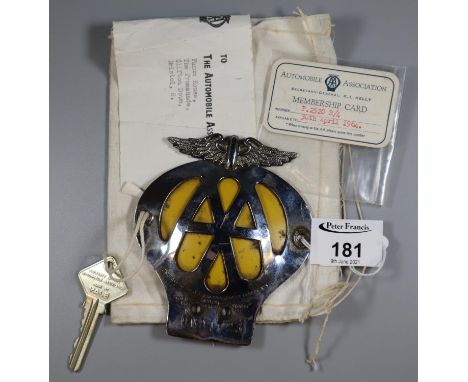 Vintage AA badge, together with kiosk key, in its original fabric pouch with attached paper address label dated 1966.(B.P. 21