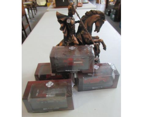 Composite study of George on his horse slaying the dragon, together with some diecast model vehicles; Atlas etc. (B.P. 21% + 