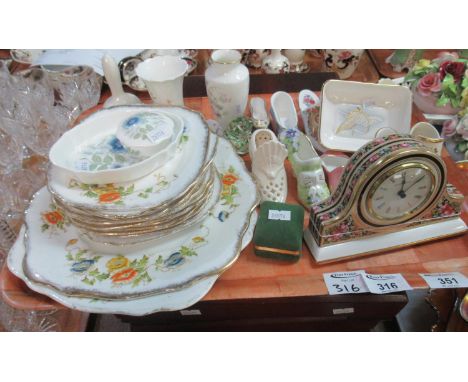 Two trays of assorted china to include; miniature ceramic boots or shoes, Wedgwood ceramic mantel clock, Wedgwood pin dishes,