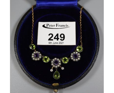 Unmarked gold amethyst, peridot, pearl and diamond set suffragette style necklace in fitted case. (B.P. 21% + VAT) Dimensions