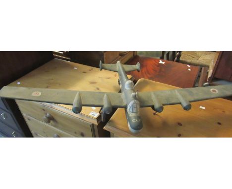 Naive model wooden and painted study of an RAF bomber plane, missing one wheel. (B.P. 21% + VAT) 