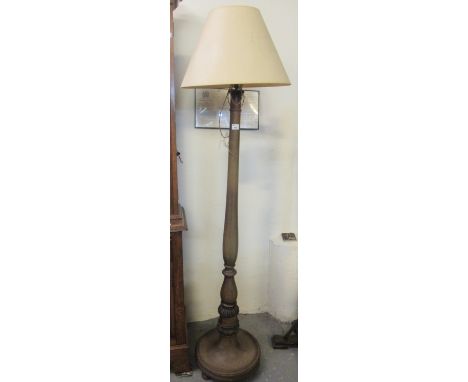 20th Century mahogany standard lamp with shade on fluted and circular moulded base. (B.P. 21% + VAT) 