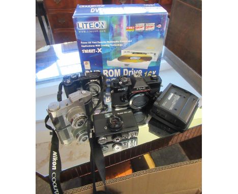 Box of assorted cameras and similar equipment to include; Olympus digital camera 8000, Japanese lenses, Liton DVDrom drive et