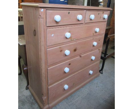 Large Victorian pine straight front chest with two short and four long drawers with turned ceramic knob handles. (B.P. 21% + 