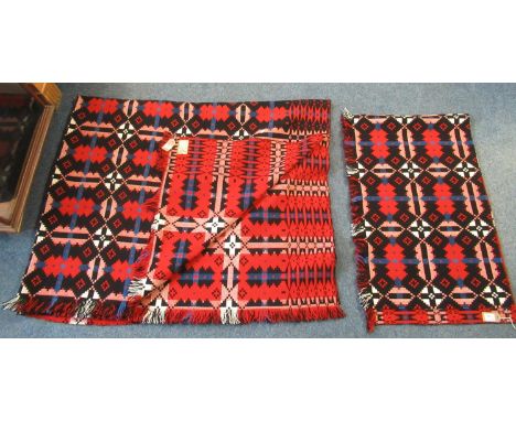 Vintage woollen red ground Welsh tapestry blanket with fringed edges and 'Brynkir Made in Wales from pure new wool' label. To