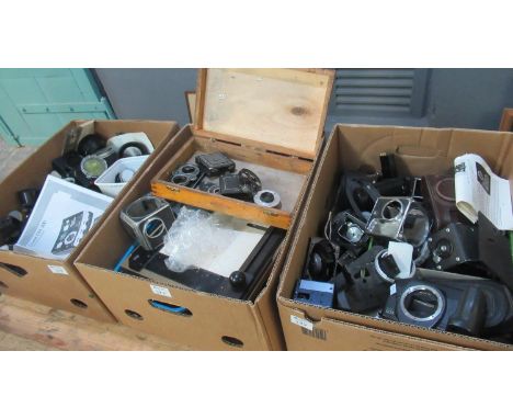 Three boxes of various photographic and dark room equipment to include: the body of a Canon EOS 600 camera, an old Microflex 