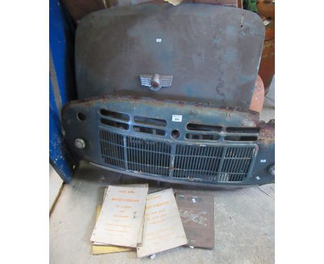 Vintage Morris bonnet and grill with chrome mount with registration plate C8J 810, together with vintage autoparts books to i