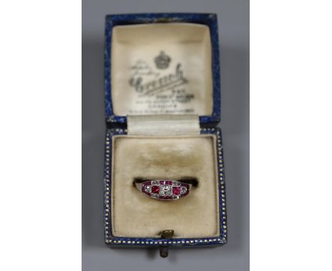 18ct gold and platinum ruby and diamond set Art Deco style ring. Ring size O. (B.P. 21% + VAT) Condition is good. We do not h