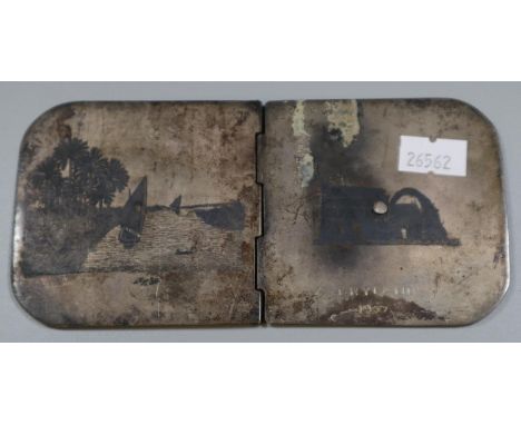 A Niello work metal hinged camera exposure meter (?). (B.P. 21% + VAT)&nbsp;Worn and grubby, especially to exterior. Inscribe