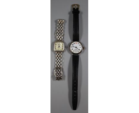 Vintage small head silver wristwatch with Arabic white enamel face and seconds dial, together with a square faced silver lady