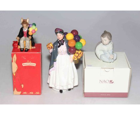 Royal Doulton Biddy Penny Farthing, Bunnykins Balloon Man, and Nao piece (3).