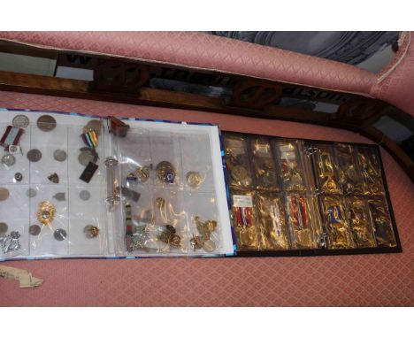 Two folders of medallions including silver and enamel Masonic (Buffalo 1954 - 64, GLE Lodge, Vulcan Lodge, Royal Order of Ant