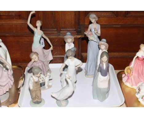 Nine Nao lady, boys, girls and swan figures.