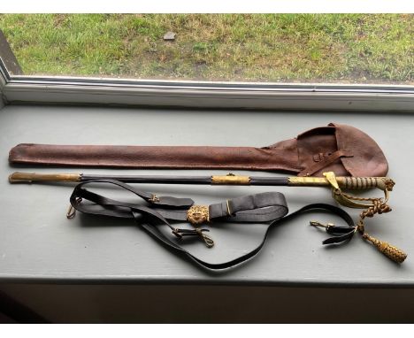 A Royal Navy officers sword, scabbard and belt, Sword is produced by Gieve Matthews &amp; Seagrove Ltd, London, Portsmouth an