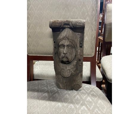 A 15th/16th century hand carved wooden panel. Possibly of William Wallace. [30cm length]
