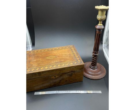 A Victorian document box detailed with inlays together with a Victorian Mahogany and brass candle stick. 