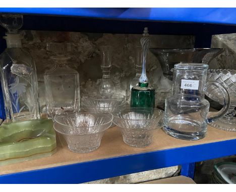 A Shelf of Crystal which includes 7 Stuart crystal bowls, Kings Own Scottish Borders Military decanter, Green glass and art g