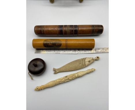 A Quantity of antique sewing items, Which includes a Victorian hand carved style bobbin, Carved Fish shaped needle holder in 