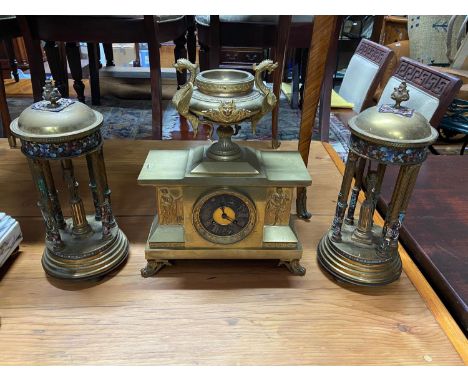 Antique Gilt brass Roman/ Greek design mantle clock and two matching garnitures, Clock consists of an A*B Movement, Gilt heav