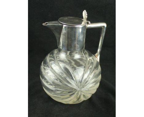 An Art Deco silver-plated and cut glass claret jugHaving sunburst effect glass body, height 20cm   CONDITION REPORT:  Height 