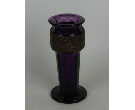 A Moser glass vase Of cylindrical form, having a gilt panel decorated with a battle scene in an amethyst colourway, height 16