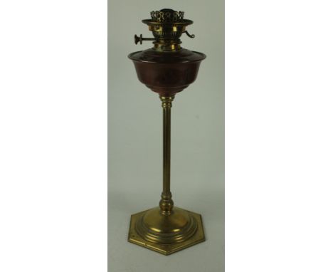 An Arts & Crafts copper and brass oil lampBy William Arthur Smith Benson, raised on hexagonal plinth base, impressed marks to